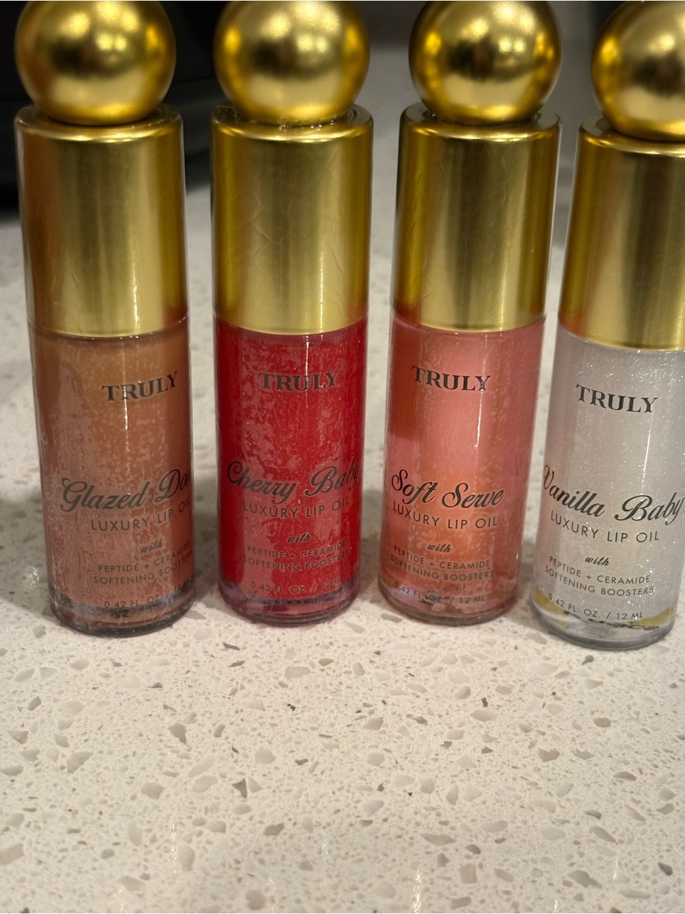 TRULY Lip Oil  - vanilla baby, soft serve, cherry baby ,Glazed donut pick 1